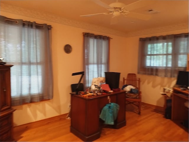 office area featuring light hardwood / wood-style flooring and ceiling fan