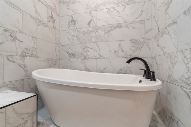 full bathroom featuring a freestanding tub