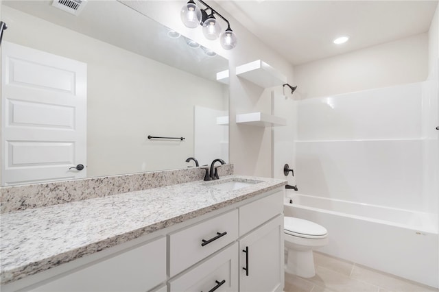 bathroom featuring toilet, vanity, shower / bathtub combination, tile patterned flooring, and visible vents