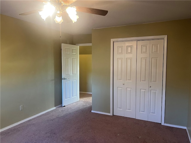 unfurnished bedroom with ceiling fan, a closet, and carpet floors