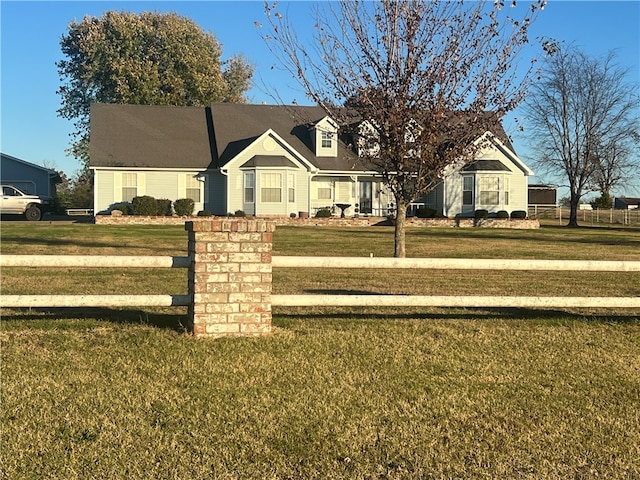 view of front of home with a front yard