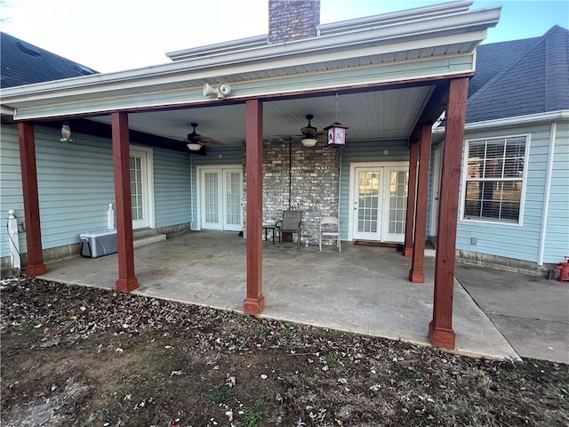 view of patio / terrace featuring ceiling fan and french doors