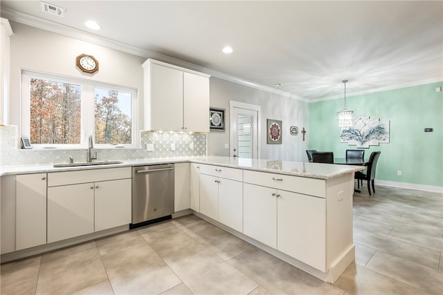 kitchen featuring crown molding, visible vents, a sink, dishwasher, and a peninsula