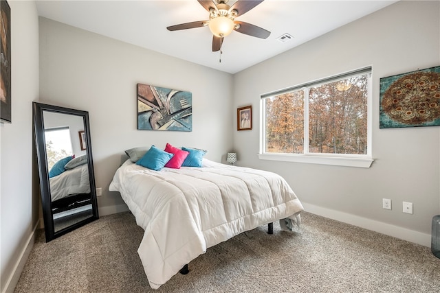 carpeted bedroom featuring ceiling fan