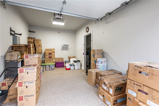 storage area with a garage and an AC wall unit