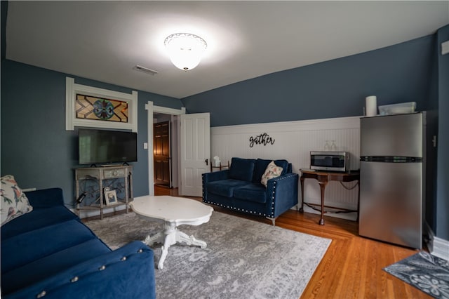 living room with hardwood / wood-style floors