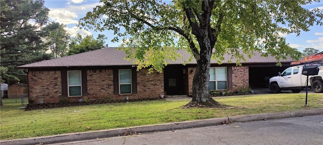 ranch-style house with a front yard