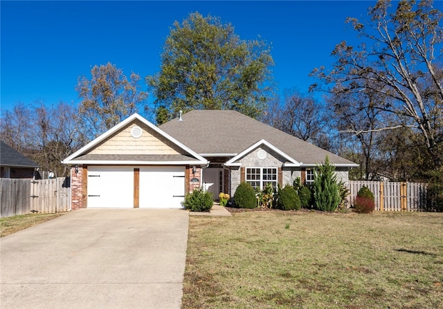 single story home featuring a front yard, concrete driveway, and fence