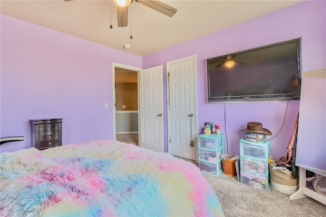 bedroom with ceiling fan and carpet floors