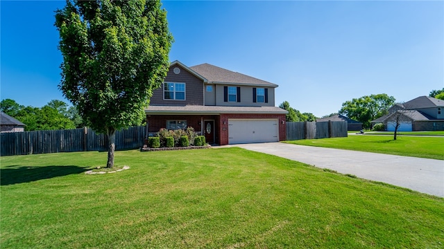 view of front of house featuring a garage and a front lawn