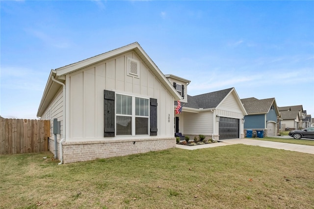 view of front facade with a garage and a front yard