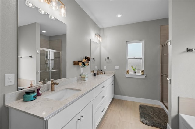 bathroom with vanity, tile patterned floors, and an enclosed shower