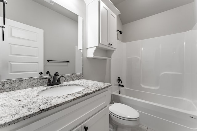 full bathroom featuring tile patterned floors, vanity,  shower combination, and toilet