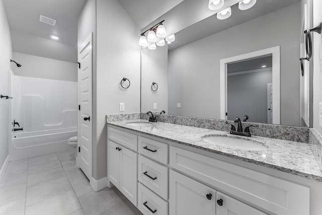 full bathroom featuring tile patterned flooring, vanity,  shower combination, and toilet