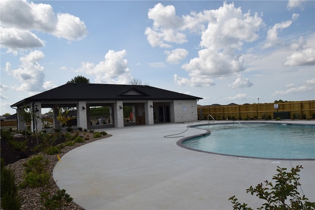 view of pool featuring a patio