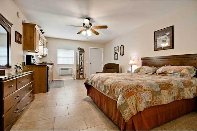 bedroom with ceiling fan, light tile patterned flooring, and an AC wall unit