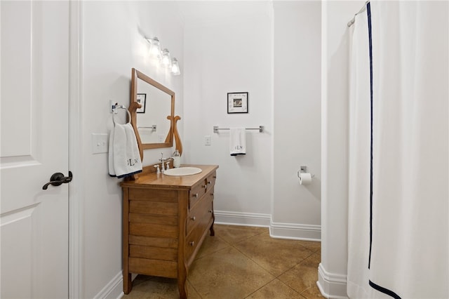 bathroom with vanity and tile patterned floors