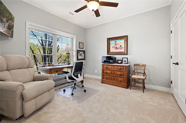 carpeted office space with ceiling fan and ornamental molding