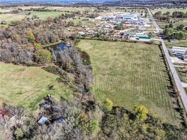 aerial view featuring a rural view and a water view