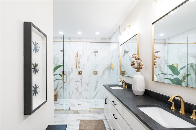 bathroom featuring vanity and a shower with door