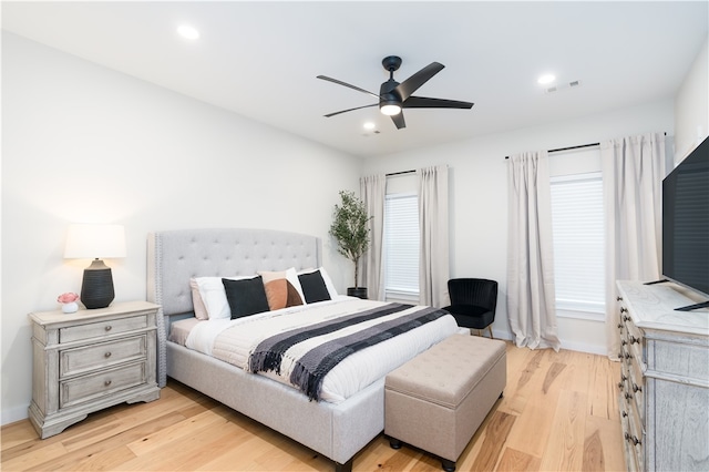 bedroom featuring ceiling fan and light wood-type flooring