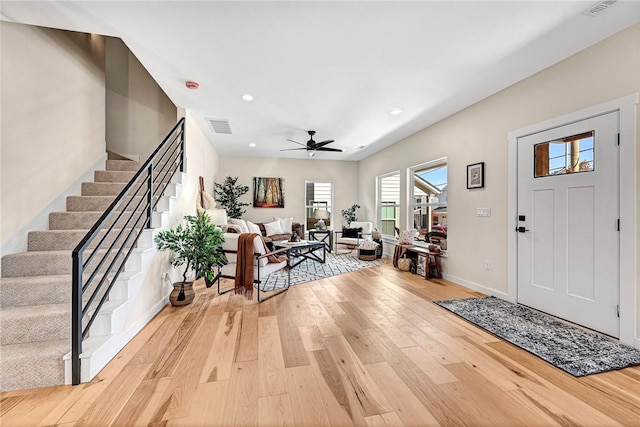 1433 S Duncan Ave, Fayetteville, AR 72701 - foyer with light wood-style floors, stairs, ceiling fan, recessed lighting, and baseboards