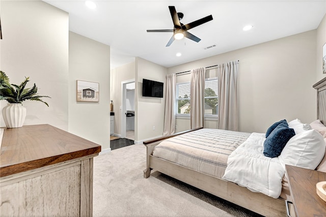 carpeted bedroom with ceiling fan