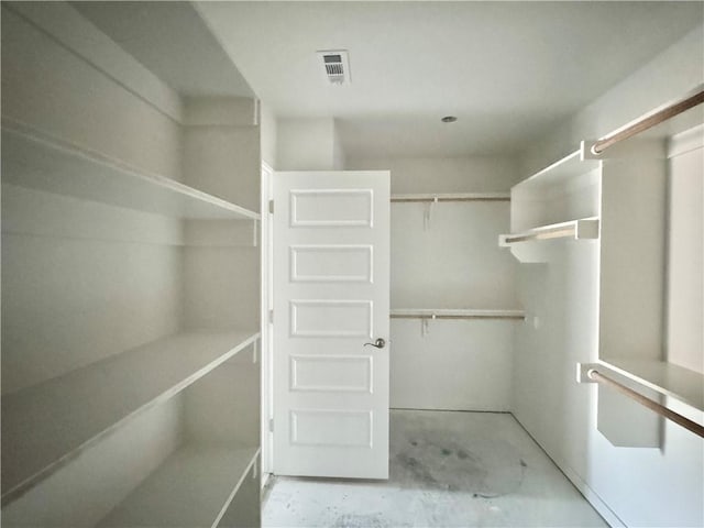 walk in closet featuring visible vents