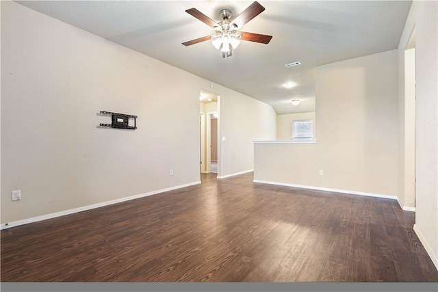 unfurnished room featuring ceiling fan and dark wood-type flooring