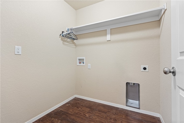 laundry area featuring electric dryer hookup, hookup for a washing machine, and hardwood / wood-style flooring