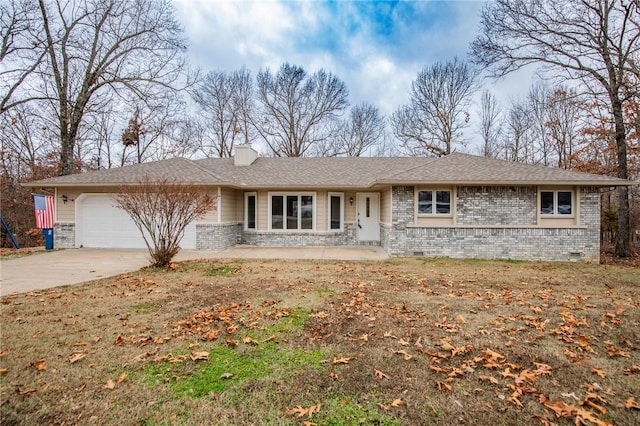 single story home with a garage