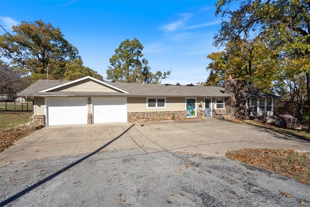 single story home with a garage