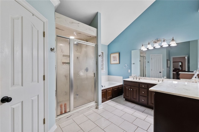 bathroom featuring tile patterned flooring, vanity, separate shower and tub, and high vaulted ceiling