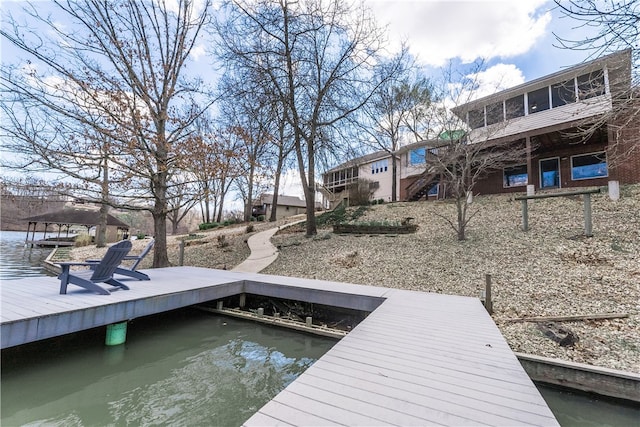 dock area featuring a water view