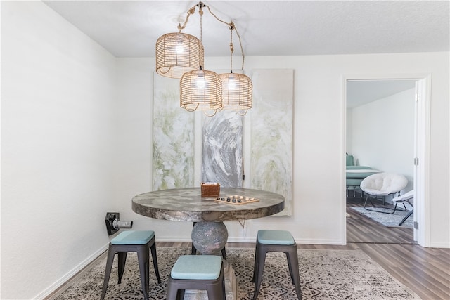 dining room featuring wood-type flooring