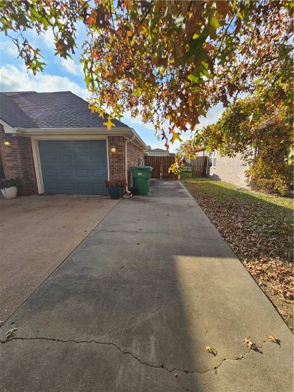 view of side of property featuring a garage