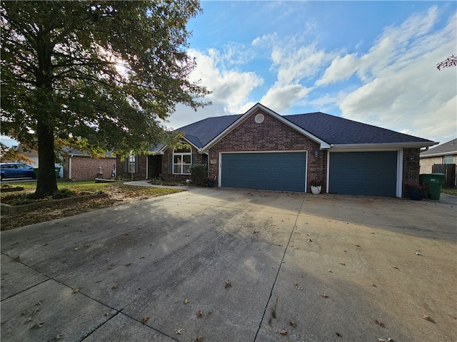 ranch-style home with a garage