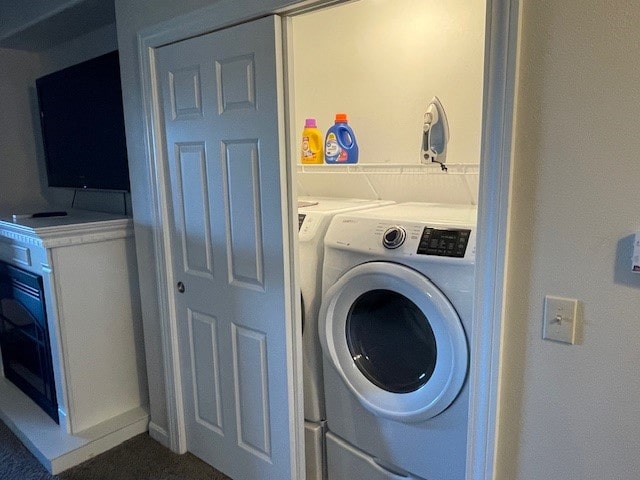 laundry area featuring separate washer and dryer