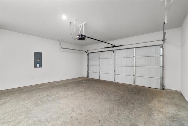 garage with electric panel and a garage door opener