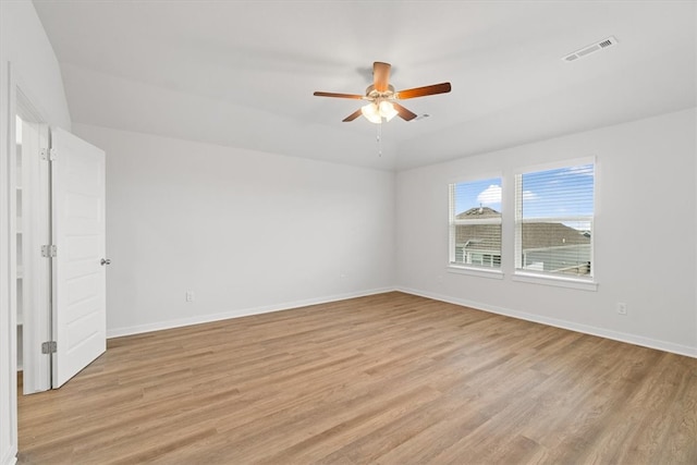 spare room with ceiling fan and light hardwood / wood-style flooring