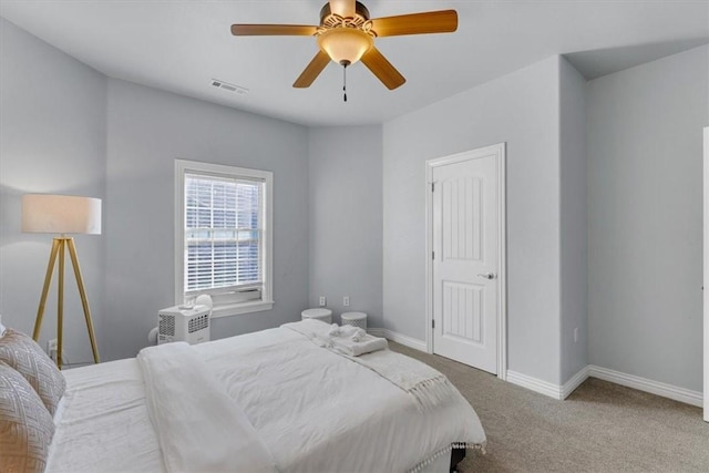 bedroom with ceiling fan and carpet