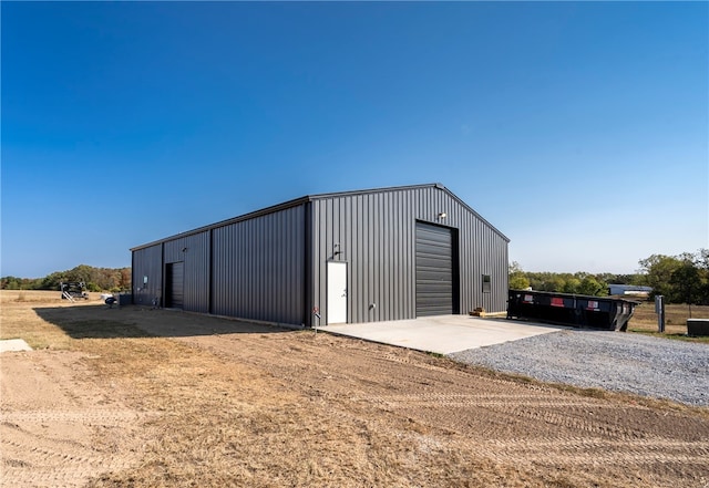 view of outbuilding featuring a garage