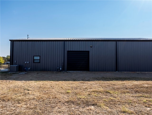 view of outbuilding featuring central AC unit