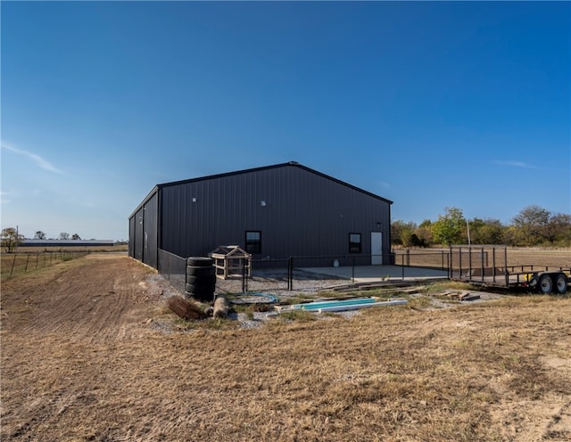 exterior space with a rural view