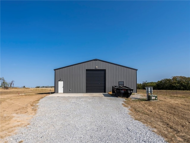 view of outbuilding featuring a garage