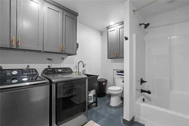 laundry area featuring washer and dryer and sink