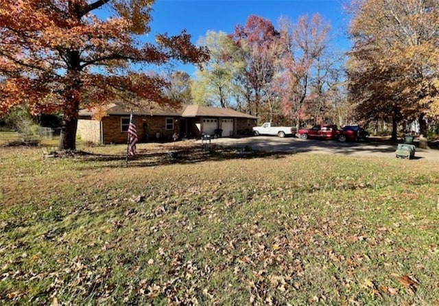 view of yard featuring a garage