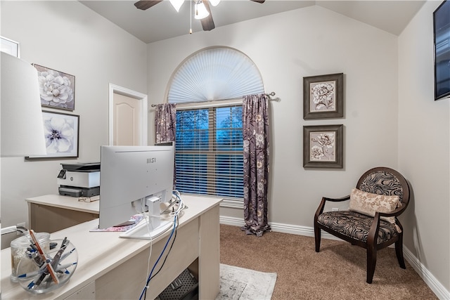 office featuring ceiling fan, light colored carpet, and vaulted ceiling