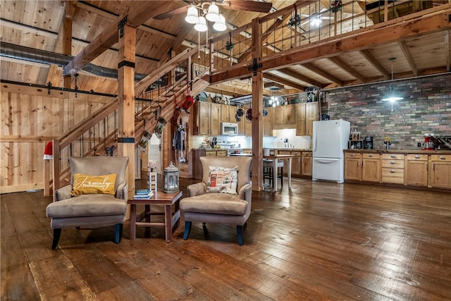 interior space featuring wood ceiling, ceiling fan, dark wood-type flooring, high vaulted ceiling, and beamed ceiling