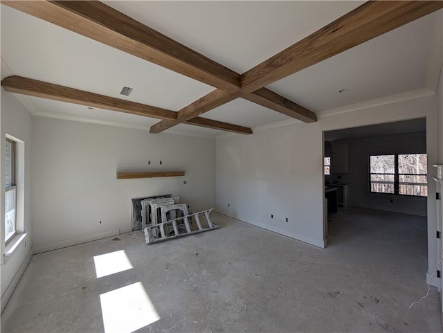 unfurnished living room featuring beam ceiling, coffered ceiling, and baseboards